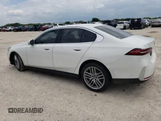 2024 BMW 5 Series 530i with VIN WBA43FJ03RCR61887, listed as a Copart auction lot 69975144 with 2,737 mi miles and Salvage Title. Bid and sale history available at carsss.com. Image 2.