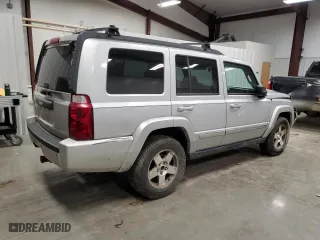 2010 Jeep Commander Sport with VIN 1J4RG4GK2AC127697, listed as a Copart auction lot 87582415 with 204,676 mi miles and Salvage Title. Bid and sale history available at carsss.com. Image 3.