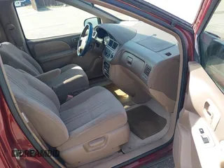 2002 Toyota Sienna CE with VIN 4T3ZF19CX2U491877, listed as a IAAI auction lot 42012361 with 59,776 mi miles. Bid and sale history available at carsss.com. Image 5.