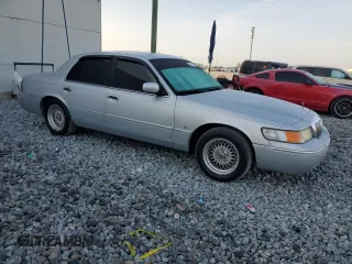 1999 Mercury Grand Marquis LS with VIN 2MEFM75WXXX682027, listed as a Copart auction lot 53906165 with 116,616 mi miles and Salvage Title. Bid and sale history available at DreamBid. Image 4.