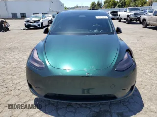 2022 Tesla Model Y Performance z VIN 7SAYGDEF2NF573979, wystawiony jako Copart lot #57778265 z przebiegiem 49 232 mil mil oraz Szkoda całkowita • Salvage title. Historia ofert i sprzedaży dostępna na DreamBid. Obrazek 5.