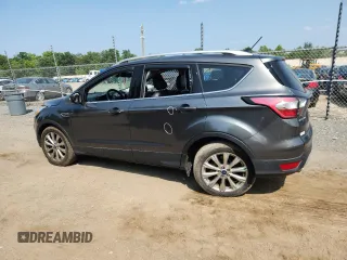 2018 Ford Escape Titanium with VIN 1FMCU9J90JUA15154, listed as a Copart auction lot 59768415 with 93,810 mi miles and Salvage title. Bid and sale history available at DreamBid. Image 2.