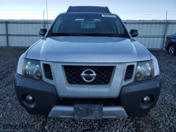 2012 Nissan Xterra X with VIN 5N1AN0NW5CC520356, listed as a Copart auction lot 82626404 with 81,307 mi miles and Salvage Title. Bid and sale history available at carsss.com. Image 5.