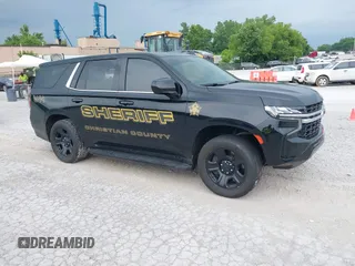 2023 Chevrolet Tahoe Commercial z VIN 1GNSKLED7PR375137, wystawiony jako IAAI lot #42342628 z przebiegiem 59 000 mil mil oraz . Historia ofert i sprzedaży dostępna na DreamBid. Obrazek 1.