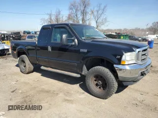 2002 Ford Super Duty F-250 XL with VIN 1FTNX21L32EA33392, listed as a Copart auction lot 48687445 with 184,777 mi miles and Salvage Title. Bid and sale history available at carsss.com. Image 4.