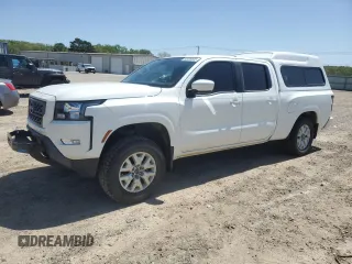 2023 Nissan Frontier SV z VIN 1N6ED1FK1PN665928, wystawiony jako Copart lot #52036625 z przebiegiem 23 760 mil mil oraz Szkoda całkowita • Salvage title. Historia ofert i sprzedaży dostępna na DreamBid. Obrazek 1.