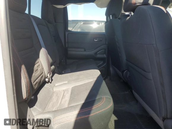 2024 Nissan Frontier Pro-4X with VIN 1N6ED1EK7RN610467, listed as a Copart auction lot 50138015 with 24,723 mi miles and Salvage title. Bid and sale history available at DreamBid. Image 10.