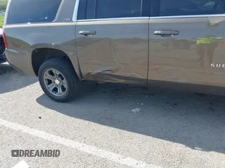 2016 Chevrolet Suburban LT z VIN 1GNSKHKC2GR289761, wystawiony jako IAAI lot #42086912 z przebiegiem 247 791 mil mil oraz . Historia ofert i sprzedaży dostępna na DreamBid. Obrazek 6.