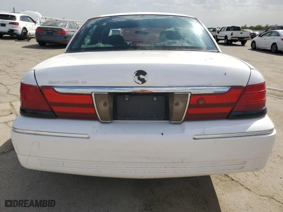 2004 Mercury Grand Marquis GS with VIN 2MEFM74W34X637265, listed as a Copart auction lot 72248594 with 139,039 mi miles and Salvage Title. Bid and sale history available at carsss.com. Image 6.