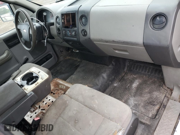 2007 Ford F-150 XL with VIN 1FTRF12247NA15687, listed as a Copart auction lot 57956945 with 303,421 mi miles and Clean title. Bid and sale history available at DreamBid. Image 8.