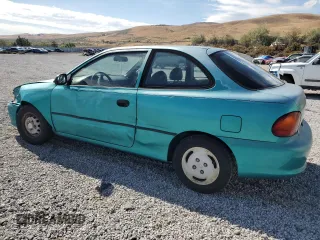 1995 Hyundai Accent z VIN KMHVD14N1SU015961, wystawiony jako Copart lot #72066404 z przebiegiem 118 163 mil mil oraz Szkody całkowita. Historia ofert i sprzedaży dostępna na DreamBid. Obrazek 2.