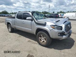 2020 Toyota Tacoma SR5 with VIN 3TMDZ5BN5LM090020, listed as a Copart auction lot 58192835 with 107,156 mi miles and Salvage title. Bid and sale history available at DreamBid. Image 4.