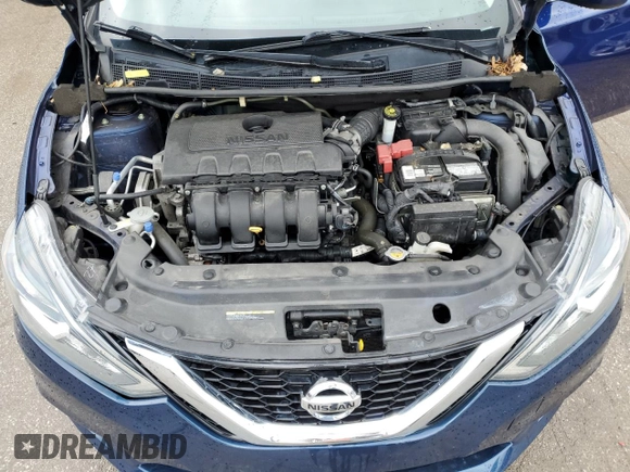 2018 Nissan Sentra S z VIN 3N1AB7AP4JY330897, wystawiony jako Copart lot #57653335 z przebiegiem 69 143 mil mil oraz Szkoda całkowita • Salvage title. Historia ofert i sprzedaży dostępna na DreamBid. Obrazek 11.