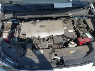2021 Toyota Prius L Eco with VIN JTDKAMFU6M3141263, listed as a IAAI auction lot 40593951 with 95,921 mi miles. Bid and sale history available at carsss.com. Image 10.
