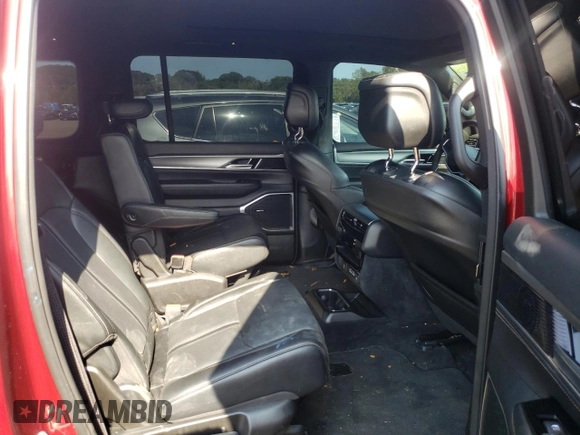 2023 Jeep Wagoneer Series II Carbide with VIN 1C4SJVBP1PS569158, listed as a Copart auction lot 57888145 with 23,613 mi miles and Salvage title. Bid and sale history available at DreamBid. Image 11.