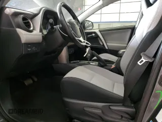 2016 Toyota RAV4 Hybrid XLE with VIN JTMRJREV0GD035203, listed as a Copart auction lot 54300225 with 153,369 mi miles and Salvage Title. Bid and sale history available at carsss.com. Image 7.