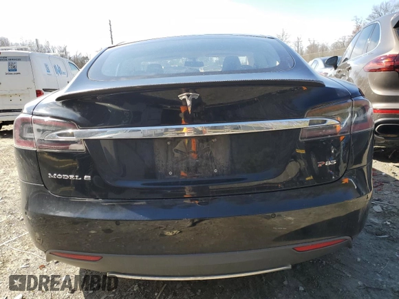 2014 Tesla Model S 60 with VIN 5YJSA1H10EFP34137, listed as a Copart auction lot 47645795 with Not provided miles and Salvage title. Bid and sale history available at DreamBid. Image 6.