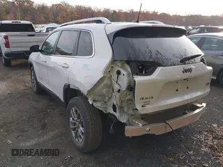 2019 Jeep Cherokee Altitude with VIN 1C4PJMLN1KD412708, listed as a IAAI auction lot 40846567 with 77,314 mi miles and . Bid and sale history available at DreamBid. Image 3.