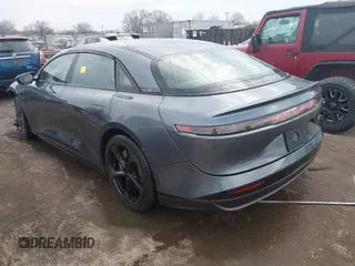 2024 Lucid Air Touring with VIN 50EA1TEA4RA004799, listed as a IAAI auction lot 41651768 with 7,779 mi miles. Bid and sale history available at carsss.com. Image 3.