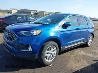 2024 Ford Edge SEL z VIN 2FMPK4J96RBA12822, wystawiony jako IAAI lot #41940628 z przebiegiem 8 981 mil mil oraz . Historia ofert i sprzedaży dostępna na DreamBid. Obrazek 18.