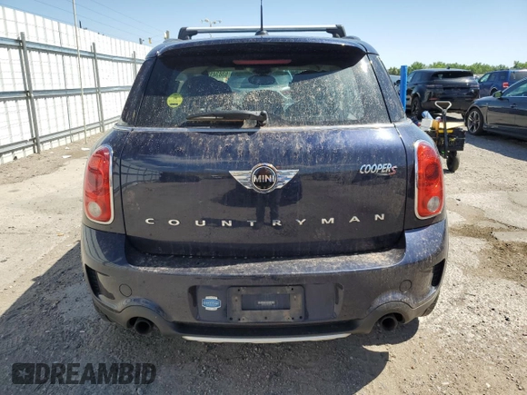 2016 MINI Countryman S with VIN WMWZC5C54GWT38489, listed as a Copart auction lot 63834335 with 102,564 mi miles and Salvage title. Bid and sale history available at DreamBid. Image 6.