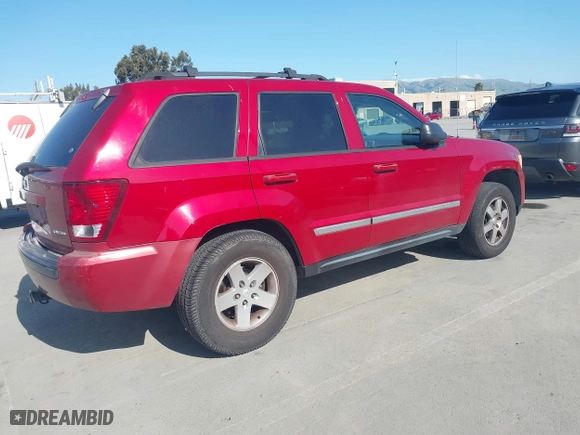 2010 Jeep Grand Cherokee Laredo with VIN 1J4PS4GK4AC121454, listed as a IAAI auction lot 41759966 with 69,390 mi miles. Bid and sale history available at carsss.com. Image 4.