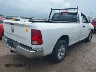 2019 Ram 1500 Classic Tradesman with VIN 3C6JR6DT8KG506165, listed as a IAAI auction lot 40721848 with 323,427 mi miles. Bid and sale history available at carsss.com. Image 4.
