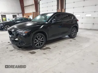 2017 Mazda CX-5 Grand Touring with VIN JM3KFBDL6H0143013, listed as a IAAI auction lot 41912979 with 122,890 mi miles. Bid and sale history available at carsss.com. Image 20.