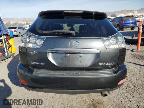 2007 Lexus RX 400h z VIN JTJGW31U172005381, wystawiony jako Copart lot #85118324 z przebiegiem 145 757 mil mil oraz Szkody całkowita. Historia ofert i sprzedaży dostępna na DreamBid. Obrazek 6.