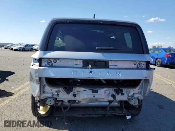 2024 Rivian R1S Adventure with VIN 7PDSGBBA4RN036045, listed as a Copart auction lot 74982414 with 9,256 mi miles and Salvage Title. Bid and sale history available at carsss.com. Image 6.