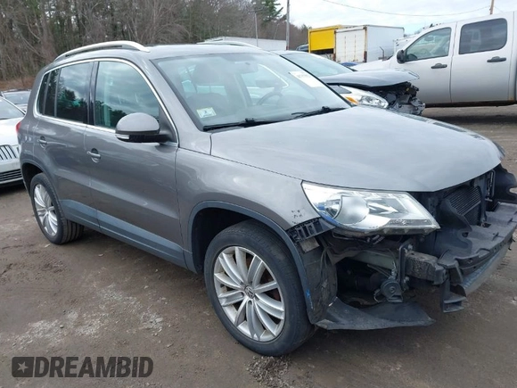 2011 Volkswagen Tiguan SE with VIN WVGBV7AX4BW532524, listed as a IAAI auction lot 41757552 with 141,115 mi miles and . Bid and sale history available at DreamBid. Image 1.