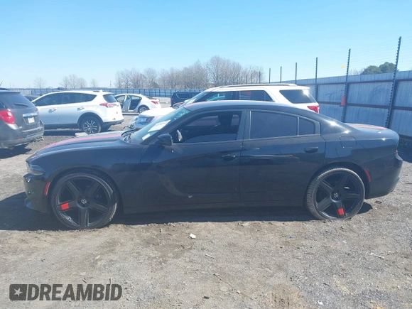 2020 Dodge Charger SXT with VIN 2C3CDXBG2LH229627, listed as a IAAI auction lot 41596342 with 124,012 mi miles and . Bid and sale history available at DreamBid. Image 14.