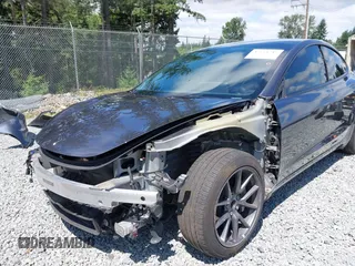 2023 Tesla Model 3 z VIN 5YJ3E1EA6PF650212, wystawiony jako IAAI lot #42554747 z przebiegiem 49 838 mil mil oraz . Historia ofert i sprzedaży dostępna na DreamBid. Obrazek 6.