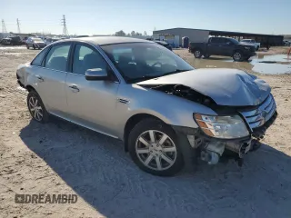 2008 Ford Taurus SEL with VIN 1FAHP24W48G133054, listed as a Copart auction lot 73537024 with 123,635 mi miles and Salvage Title. Bid and sale history available at carsss.com. Image 4.