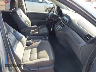 2007 Honda Odyssey EX-L with VIN 5FNRL38677B021464, listed as a IAAI auction lot 41568582 with 131,359 mi miles and . Bid and sale history available at DreamBid. Image 5.