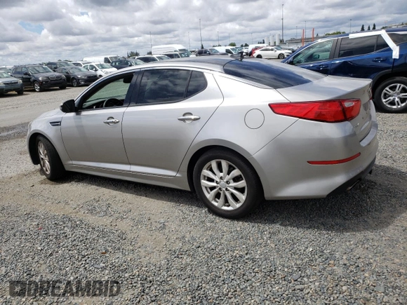 2014 Kia Optima EX z VIN 5XXGN4A7XEG343052, wystawiony jako Copart lot #56757305 z przebiegiem 210 678 mil mil oraz Tytuł czysty. Historia ofert i sprzedaży dostępna na DreamBid. Obrazek 2.