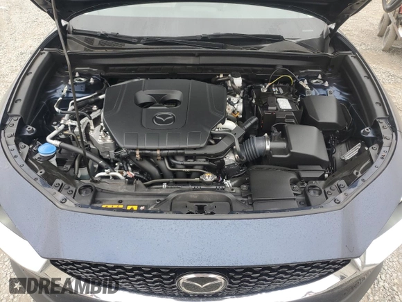 2024 Mazda CX-30 S Preferred z VIN 3MVDMBCM2RM658640, wystawiony jako Copart lot #58672425 z przebiegiem 7 977 mil mil oraz Szkoda całkowita • Salvage title. Historia ofert i sprzedaży dostępna na DreamBid. Obrazek 12.