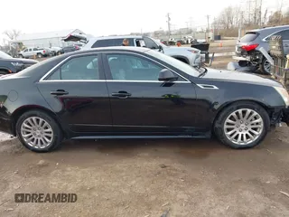 2011 Cadillac CTS Premium with VIN 1G6DS5ED7B0101210, listed as a IAAI auction lot 41802027 with 127,701 mi miles. Bid and sale history available at carsss.com. Image 13.