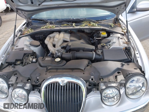 2003 Jaguar S-Type with VIN SAJEA01T83FM48713, listed as a IAAI auction lot 41402152 with 142,875 mi miles and . Bid and sale history available at DreamBid. Image 10.