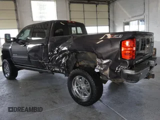 2015 Chevrolet Silverado 3500HD LT with VIN 1GC4KZC84FF595989, listed as a Copart auction lot 70707104 with 96,817 mi miles and Salvage Title. Bid and sale history available at carsss.com. Image 4.