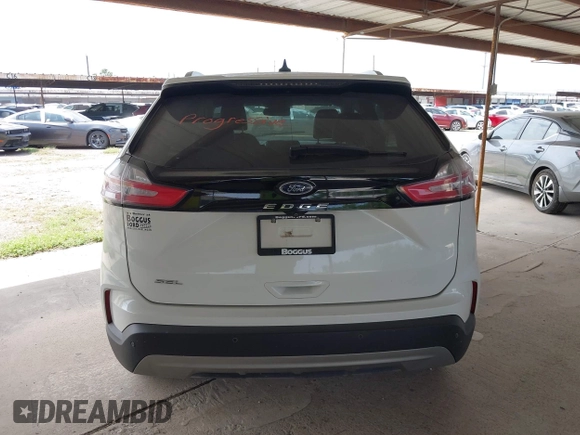 2021 Ford Edge SEL z VIN 2FMPK3J98MBA32220, wystawiony jako IAAI lot #41945825 z przebiegiem Nie podano mil oraz . Historia ofert i sprzedaży dostępna na DreamBid. Obrazek 16.
