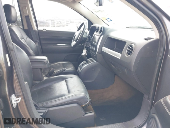 2016 Jeep Compass High Altitude Edition with VIN 1C4NJCEA1GD720223, listed as a IAAI auction lot 41879625 with 147,458 mi miles. Bid and sale history available at carsss.com. Image 5.