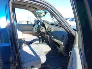 2005 Jeep Liberty Limited with VIN 1J4GK58K55W502769, listed as a IAAI auction lot 41241319 with 153,091 mi miles. Bid and sale history available at carsss.com. Image 5.