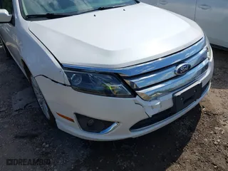2011 Ford Fusion Hybrid with VIN 3FADP0L33BR116725, listed as a IAAI auction lot 42001023 with 172,845 mi miles. Bid and sale history available at carsss.com. Image 6.