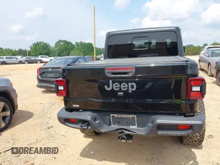 2021 Jeep Gladiator Willys with VIN 1C6HJTAG7ML514114, listed as a IAAI auction lot 42399793 with 78,829 mi miles and . Bid and sale history available at DreamBid. Image 16.