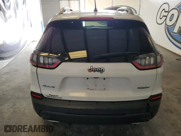 2020 Jeep Cherokee Latitude with VIN 1C4PJMCX8LD530824, listed as a Copart auction lot 82515704 with 63,611 mi miles and Clean Title. Bid and sale history available at carsss.com. Image 6.