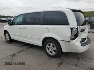 2009 Dodge Grand Caravan SE z VIN 2D8HN44EX9R533530, wystawiony jako Copart lot #59548375 z przebiegiem 130 956 mil mil oraz Szkoda całkowita • Salvage title. Historia ofert i sprzedaży dostępna na DreamBid. Obrazek 2.
