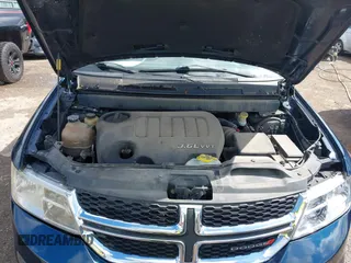 2013 Dodge Journey SXT z VIN 3C4PDDBG0DT614818, wystawiony jako IAAI lot #42270643 z przebiegiem 151 207 mil mil oraz . Historia ofert i sprzedaży dostępna na DreamBid. Obrazek 10.