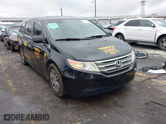 2012 Honda Odyssey EX-L with VIN 5FNRL5H64CB142247, listed as a IAAI auction lot 41722015 with 179,637 mi miles and . Bid and sale history available at carsss.com. Image 1.