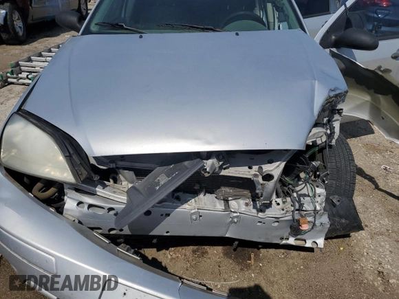 2005 Ford Focus S with VIN 1FAFP34N95W247489, listed as a Copart auction lot 60858415 with Not provided miles and Salvage title. Bid and sale history available at DreamBid. Image 11.